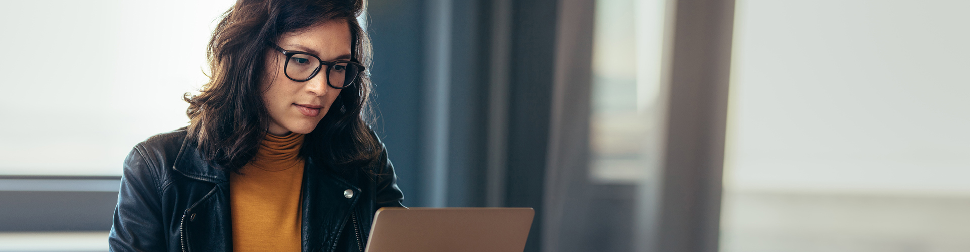 professional woman working on her laptop